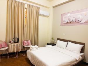 Postel nebo postele na pokoji v ubytování Gentlemen B&B