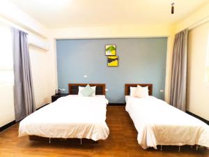 Postel nebo postele na pokoji v ubytování Gentlemen B&B
