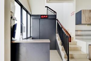 Fotografie z fotogalerie ubytování OYO 90215 Ada Residence v destinaci Poponcal 2