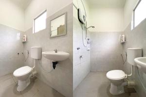 a bathroom with two toilets and a sink at Hotel O Dh Residence in Kota Belud +48 photos