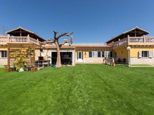 a large yard in front of a house at Villa in Maspalomas with Heated Pool & Sports in San Bartolomé de Tirajana
