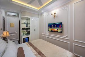 Voodi või voodid majutusasutuse Royal Holiday Hanoi Hotel toas