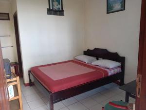 Katil atau katil-katil dalam bilik di Liemas hotel