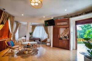 TV a/nebo společenská místnost v ubytování Tea Resort