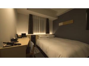 Un ou plusieurs lits dans un hébergement de l'établissement Tmark City Hotel Sapporo Odori - Vacation STAY 85601v