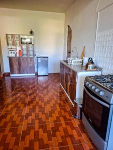 Una cocina o cocineta en Loft Colca's home