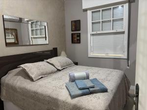 Katil atau katil-katil dalam bilik di Apto 1 dorm - Próx Praia- Santos