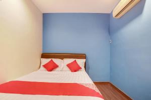 Postel nebo postele na pokoji v ubytování OYO 90282 Hotel Taj Inn, Seksyen 7