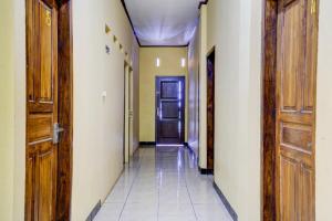 Fotografie z fotogalerie ubytování OYO 1I3676 Wisma Al-fahmi Syariah v destinaci Maniskaler