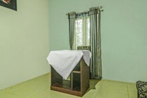 Letto o letti in una camera di Hotel O Papi Inn Guesthouse