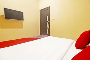TV o dispositivi per l'intrattenimento presso Hotel O Papi Inn Guesthouse