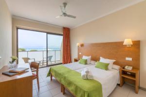 Postel nebo postele na pokoji v ubytování Hotel Amazonas + 21 fotografií