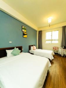 Postel nebo postele na pokoji v ubytování Gentlemen B&B