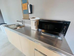 Köök või kööginurk majutusasutuses Mikami Asakusabashi Hotel