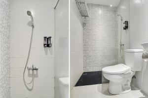A bathroom at Collection O Cihampelas Near Ciwalk Formerly Regia Cihampelas