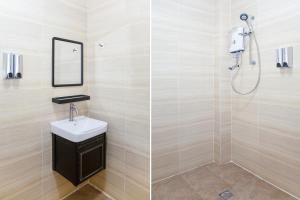 Koupelna v ubytování Capital O 90406 Mirani Hotel