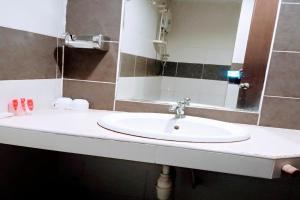 Koupelna v ubytování OYO 90411 Perdana Hotel Labuan