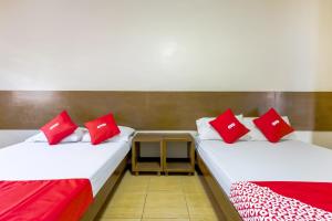 Postel nebo postele na pokoji v ubytování Metro Deluxe Residences