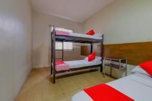 Postel nebo postele na pokoji v ubytování Metro Deluxe Residences