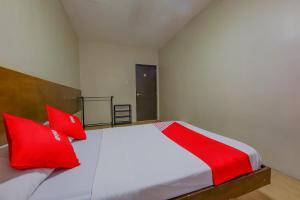 Postel nebo postele na pokoji v ubytování Metro Deluxe Residences