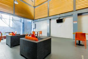 TV a/nebo společenská místnost v ubytování Metro Deluxe Residences