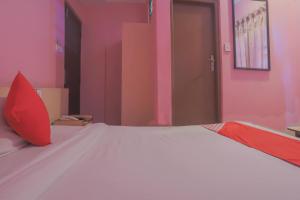 Voodi või voodid majutusasutuse OYO 789 Hotel Shivam Plaza toas
