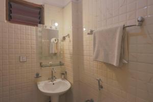 Vannituba majutusasutuses OYO 789 Hotel Shivam Plaza