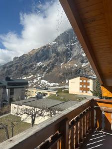 a balcony with a view of a mountain at Touristenheim Bergfreude in Leukerbad