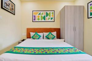Letto o letti in una camera di Treebo Moon Waalk, Patia