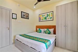 Letto o letti in una camera di Treebo Moon Waalk, Patia