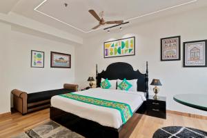 Letto o letti in una camera di Treebo Moon Waalk, Patia