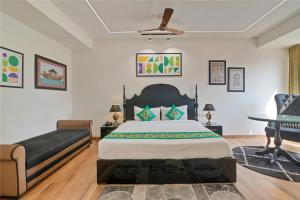 Letto o letti in una camera di Treebo Moon Waalk, Patia