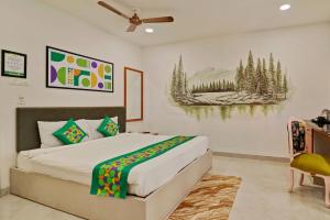 Letto o letti in una camera di Treebo Moon Waalk, Patia