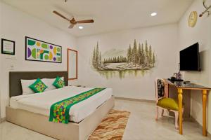 Letto o letti in una camera di Treebo Moon Waalk, Patia
