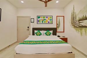 Letto o letti in una camera di Treebo Moon Waalk, Patia