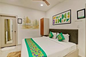 Letto o letti in una camera di Treebo Moon Waalk, Patia