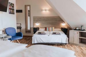 Postel nebo postele na pokoji v ubytování Best Western Hotel Kurfürst Wilhelm I.