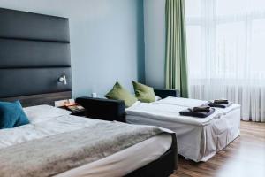 Postel nebo postele na pokoji v ubytování Best Western Hotel Kurfürst Wilhelm I.