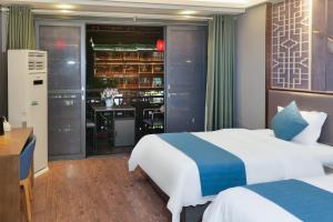 Xizha River View Homestay客房内的一张或多张床位