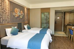 Xizha River View Homestay客房内的一张或多张床位