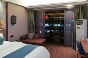 Xizha River View Homestay客房内的一张或多张床位