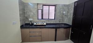 Kuchyň nebo kuchyňský kout v ubytování silent view service apartment + 13 fotografií