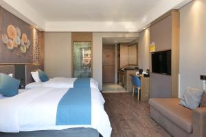 Xizha River View Homestay客房内的一张或多张床位