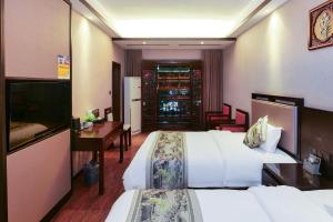 Xizha River View Homestay客房内的一张或多张床位