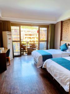 Xizha River View Homestay客房内的一张或多张床位