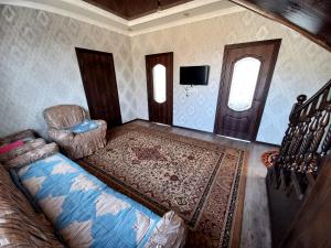 Ένα ή περισσότερα κρεβάτια σε δωμάτιο στο Beksultan guest house +16 φωτογραφίες