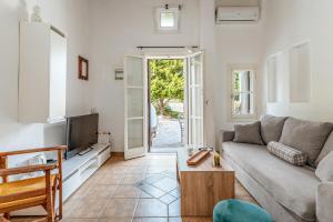 Posezení v ubytování Myconian V Pool Residence