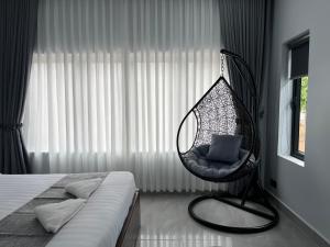 Ένα ή περισσότερα κρεβάτια σε δωμάτιο στο Family Motel
