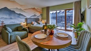 Posedenie v ubytovaní Apartamenty Sun & Snow Resort Karkonosze