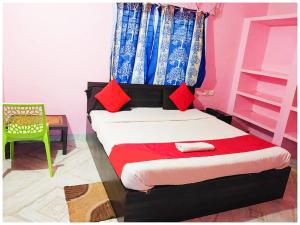 Voodi või voodid majutusasutuse Hotel Bhubaneswar MADISON INN PATIA toas